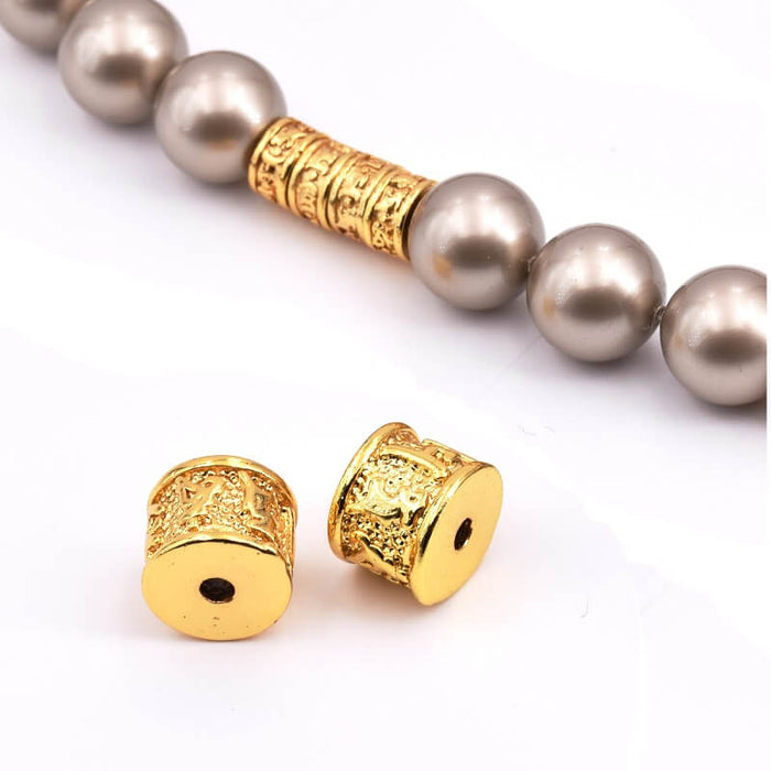 Tube Bead Ethnic Zylinder Qualität Golden - 9x7mm - Loch: 1.5mm (1)